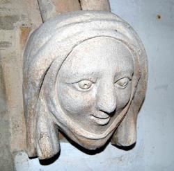 female head in Stagsden church porch December 2007